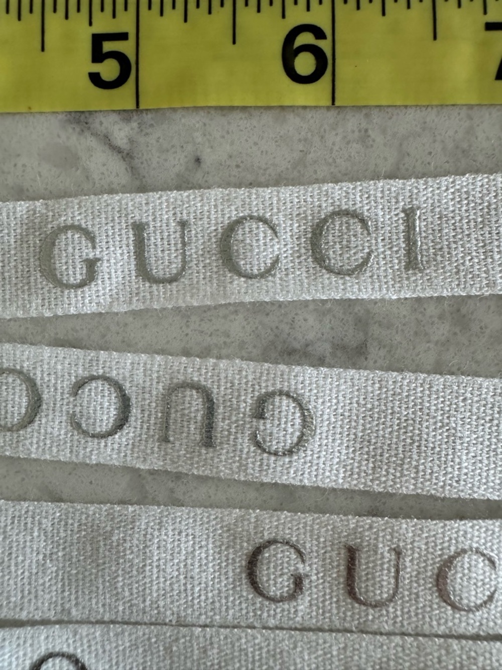 Gucci White Ribbon with Repeating Silver Logo - Picture 2 of 3
